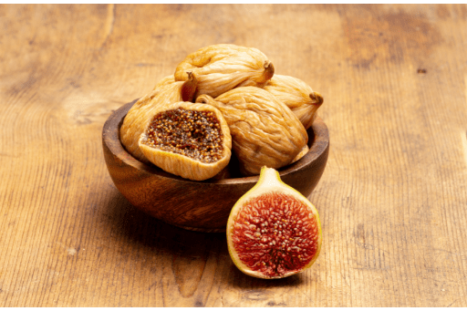 Dry figs dry fruit in a wooden bowl