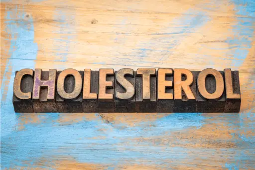 Cholesterol written on wooden boards