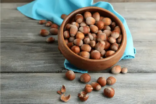 Hazelnuts in wooden bowl