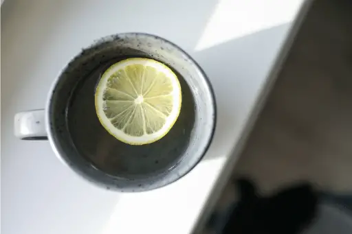Close Up Photo of Mug With Sliced Lemon