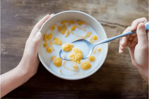 Child eating corn flakes