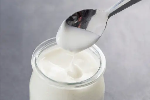 Yogurt with spoon