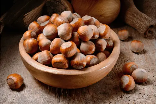 Hazelnuts in wooden bowl