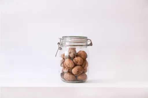 Walnuts in a glass jar