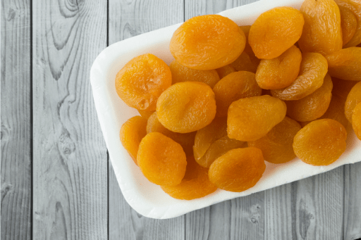 Dried apricot in white plate