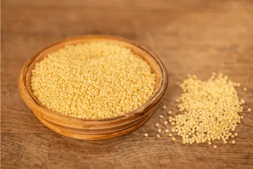 Foxtail millet in wooden bowl