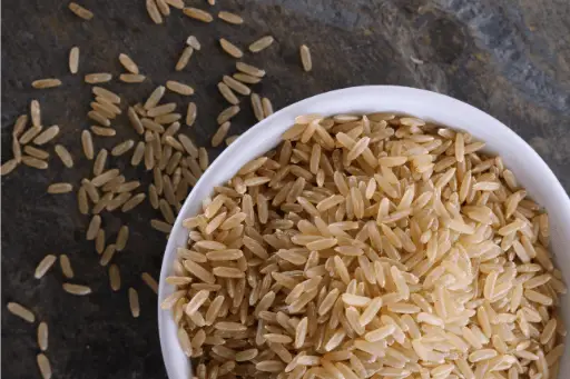 Raw brown rice in bowl