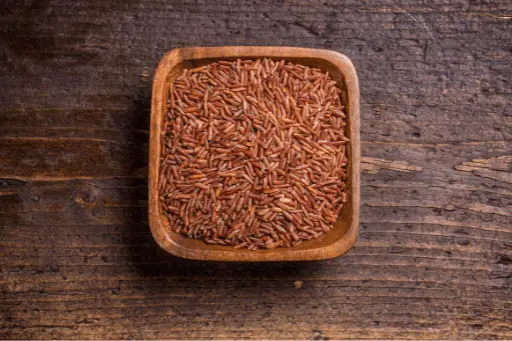Navara rice in wooden square bowl